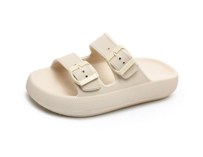 A pair of beige eva cloud sandals
