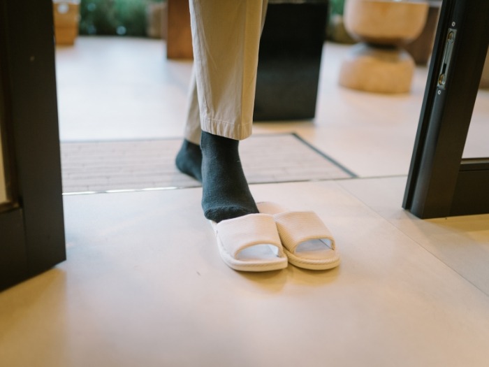 A pair of comfortable house slippers.