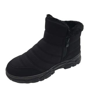 Black winter boot with fluffy trim and zipper closure on the side.