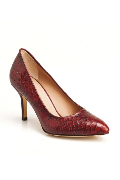 A pair of red snakeskin pattern high heels with a classic pointed toe design and stiletto heel.