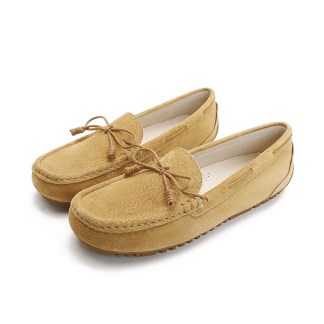 Tan suede moccasin loafer shoes with a bow tie detail, offering a comfortable and stylish option for casual wear.